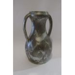 An Arts and Crafts Compton Pottery twin handled vase with silvered glaze,