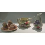 Three pieces of Radford pottery, twin handled squat form vase, jug and a condiment set on tray,