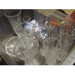 A box of glassware and Delft vase