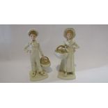 A pair of Victorian Worcester porcelain figures, boy and girl carrying baskets approx 21.