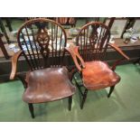 Circa 1860 a pair of elm hoop back Windsor elbow chairs,