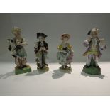 Four late 19th/early 20th Century porcelain figures, two by Sitzendorf depicting gardeners 11.