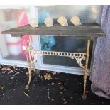 A Georgian cast metal trestle table with spindle stretcher, possibly Coalbrook,