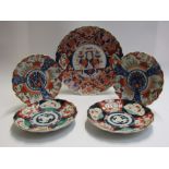 Three late 19th/ early 20th century Japanese Imari plates 21cm & 31cm diameter and two others (5)