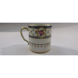 A late 18th Century Serves porcelain coffee can of cylindrical shape with kicked loop handle