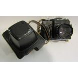 A vintage Russian 35mm camera, Zenith II with leather case,