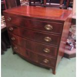 An early Victorian crossbanded mahogany bow front chest of four graduating long drawers with brass