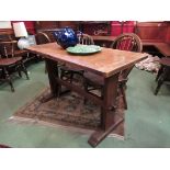 An elm 20th Century oak trestle table,