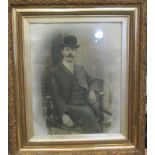 An early 20th Century photographic portrait of handsome gentleman with moustache and bowler hat in