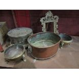 A 19th Century copper jardiniere with lion mask ring handles, two brass pots,