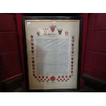 A facsimile copy of the Magna Carta, framed and glazed,