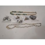 A collection of pearl necklaces and earrings including freshwater and blister pearls