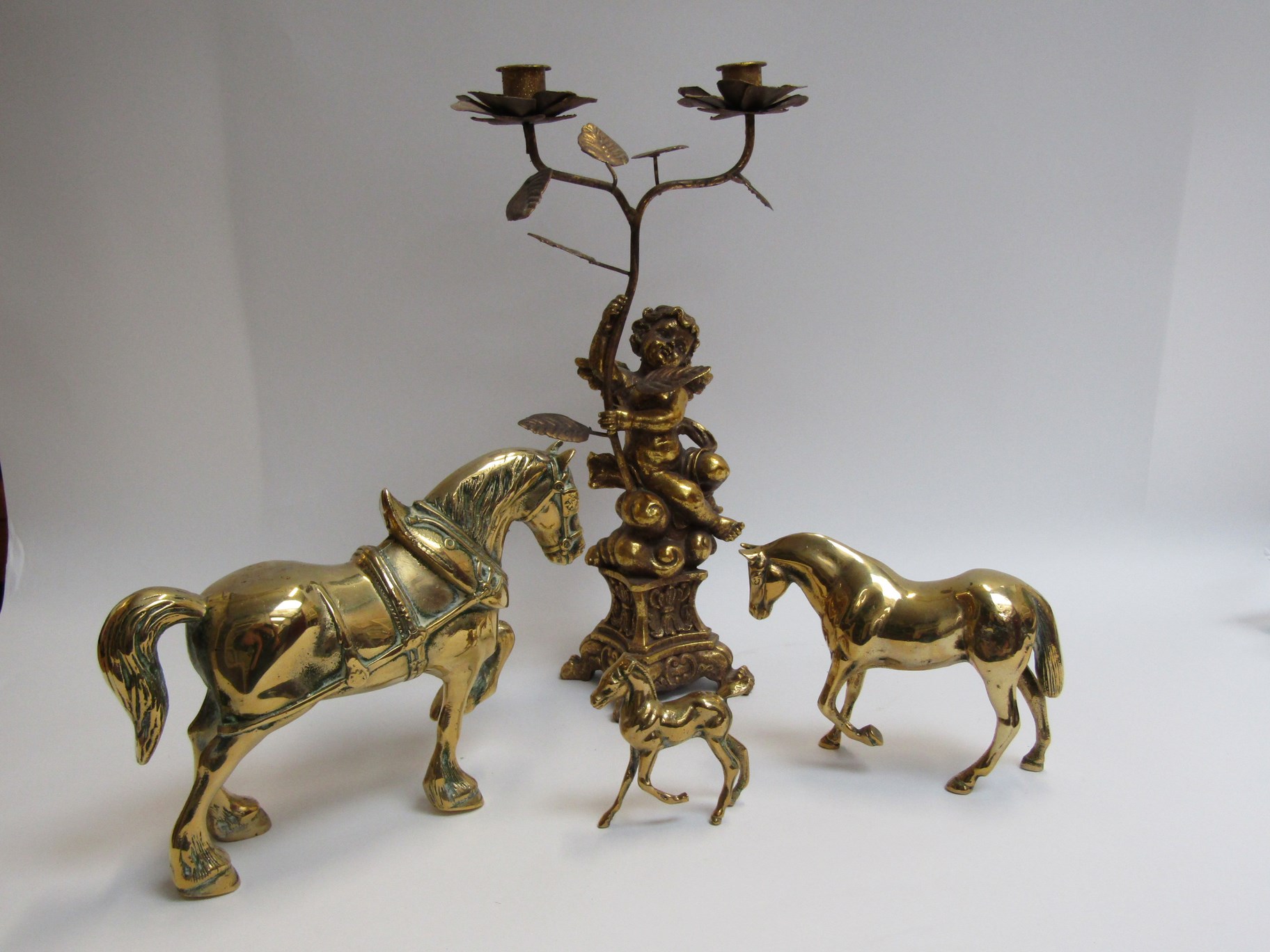 A gilt cherub floral candlestick and horse figures (4)