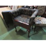 An Edwardian mahogany quarter veneered dressing table stool the single base drawer on pad foot