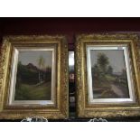 A pair of late 19th Century gilt frames with landscape scenes,