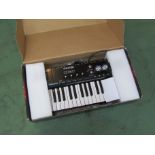 A Line 6 POD Studio KB37 MIDI keyboard with digital recording interface,