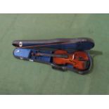 A late 19th/early 20th Century full size (4/4) violin, two piece figured maple back, student's bow,