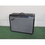 A Fender "65" Twin Reverb 85 watt amplifier with vibrato, reverb and foot switch.