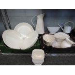 A selection of white ceramics including jug, vase,