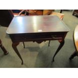 A George III style mahogany silver table with single frieze drawer flanked either ends by brushing