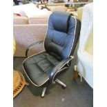 A "Real Space, Soho" swivel office desk chair,