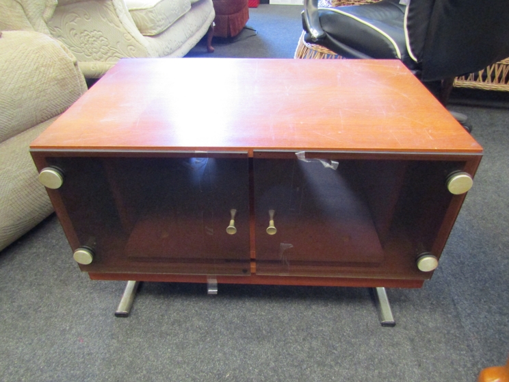 A retro teak two door TV cabinet