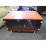 A retro teak two door TV cabinet