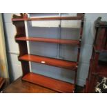A Victorian mahogany and pine four tier freestanding/hanging wall shelves with shaped sides