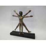 A resin bronze figure of the Vitruvian man