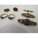 Three gold brooches,