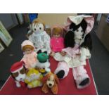 Two large ragdolls, two baby dolls, three plush toys,