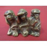 A vintage brass Three Wise Monkeys sculpture