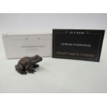 A limited edition solid bronze frog, boxed with certificate,