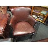 A Georgian style mahogany desk chair the leather upholstery having brass stud decoration over