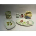 Six pieces of Radford pottery - three squat form vases, mustard pot and oval and leaf form dish,