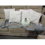 A set of four silver coloured cushions,