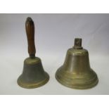 Two brass bells including wooden handle example