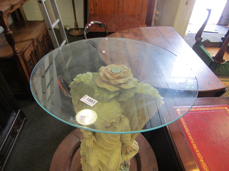 A modern glass topped occasional table with Angel design base, 57. - Image 4 of 7