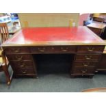 In the manner of 'Bevan Funnell' a George III style flame mahogany twin pedestal writing desk the