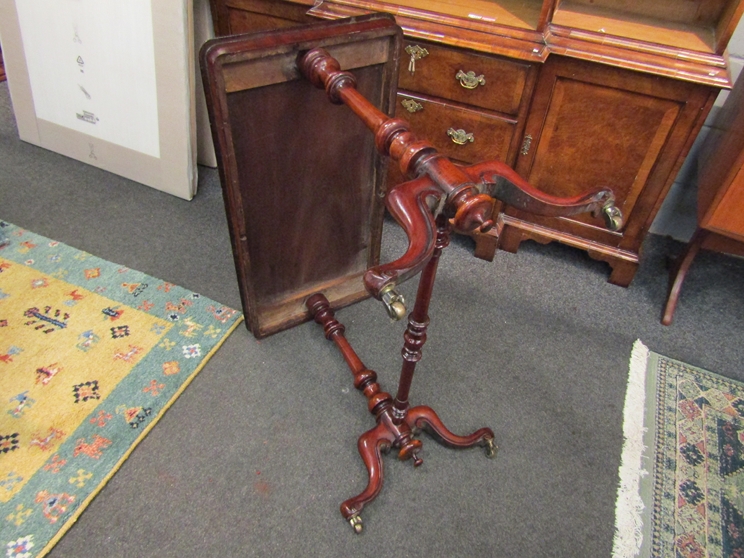 A Victorian mahogany stretcher table with brass castors and turned supports, - Image 4 of 4