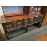 A 17th Century style oak dresser base the three drawers with moulded decoration over turned legs