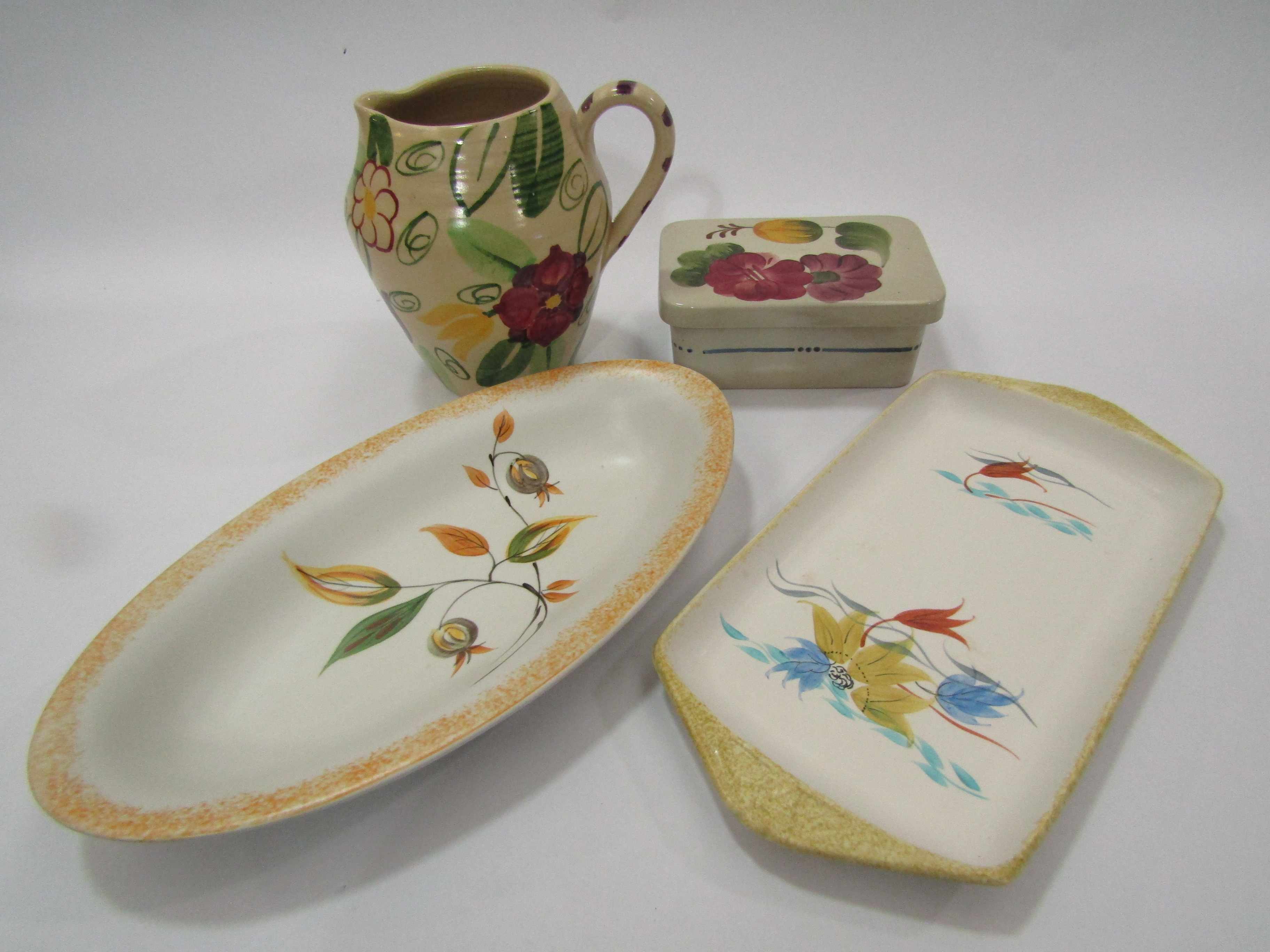 Four pieces of Radford pottery, butter dish, oval dish, sandwich tray and water jug,