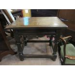 A pair of pegged oak joined stools with chip carved seat over fretwork friezes on turned legs