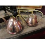 Two 1960's/70's copper tepots with canework handles including Wagner,
