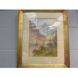 An Edwardian watercolour depicting snow capped mountains and river, gilt framed,