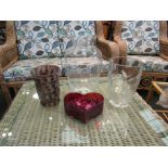 Three glass vases and a heart form bowl