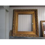 An ornate gilt frame 93 x 85cm