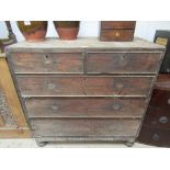 A Georgian mahogany two over three chest of drawers,