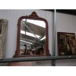 A Victorian style wall mirror,