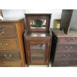 An Edwardian mahogany single door cabinet,